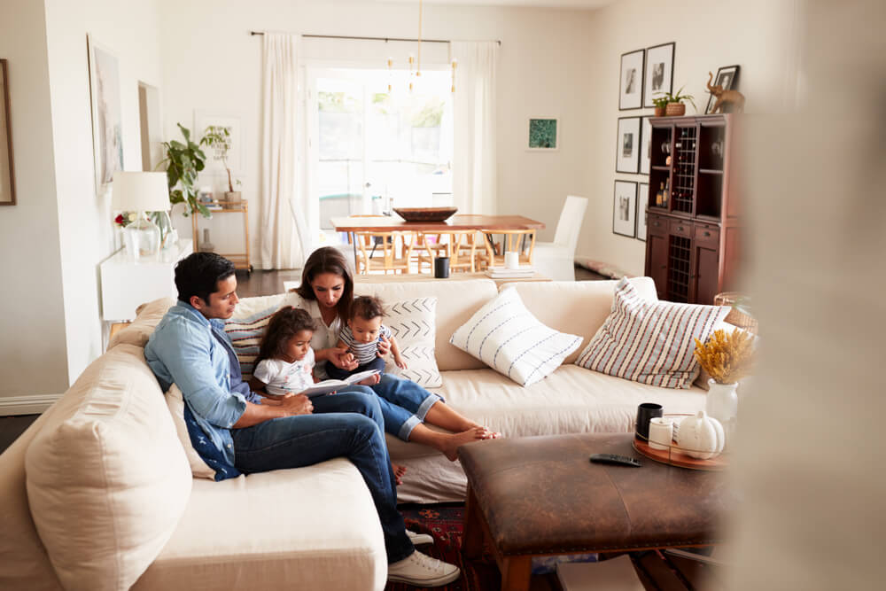 Family relaxing at home while learning about Georgia home insurance deductibles.